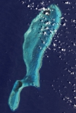 Das Lighthouse Reef vom Weltraum aus (Foto: Wikipedia/Jesse Allen)